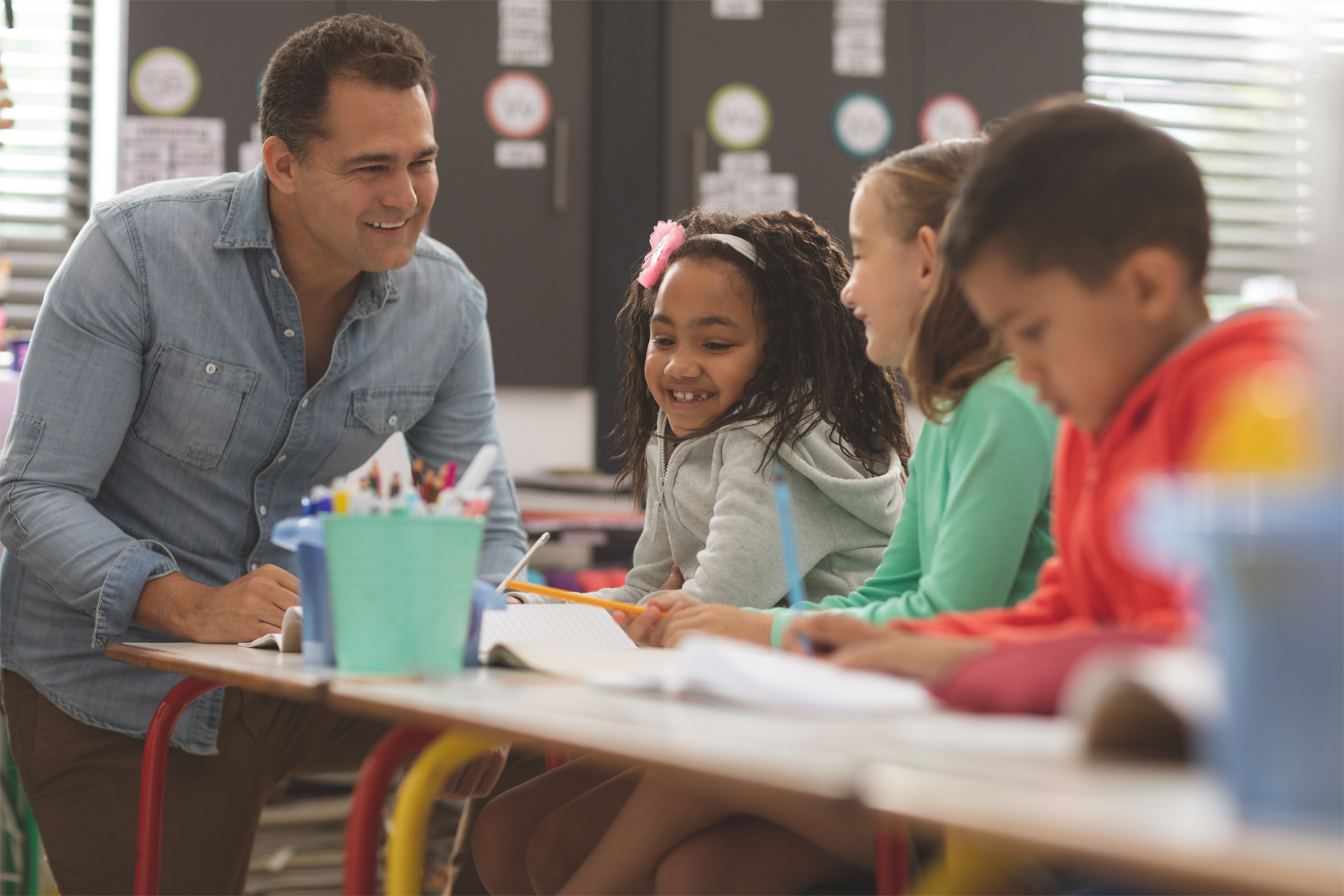 surface-level-view-of-a-teacher-interacting-with-students surface-level-view-of-a-teacher-interacting-with-students