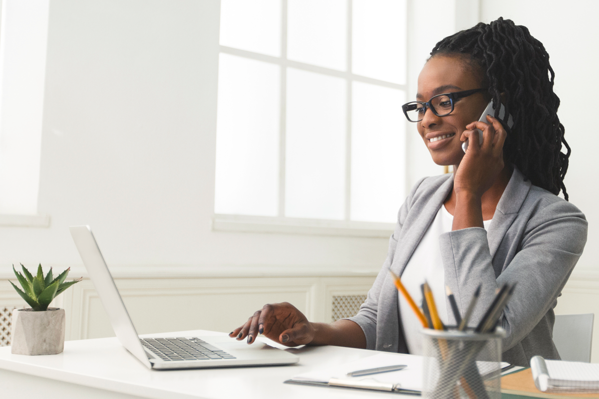 african-american-lady-talking-to-business-partner-GUX9CP7