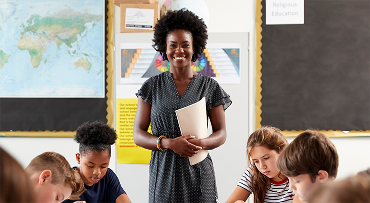 upclose.portrait-of-female-high-school-teacher-standing-SC5NGQE (1)